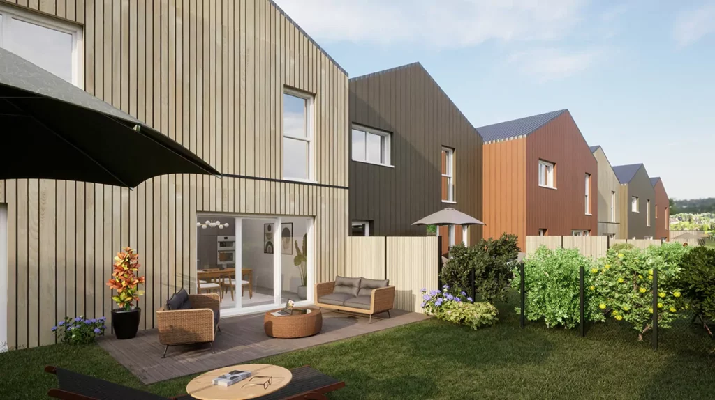 Maisons modernes avec bardage bois, terrasse aménagée, espaces verts et mobilier extérieur pour un cadre de vie agréable.