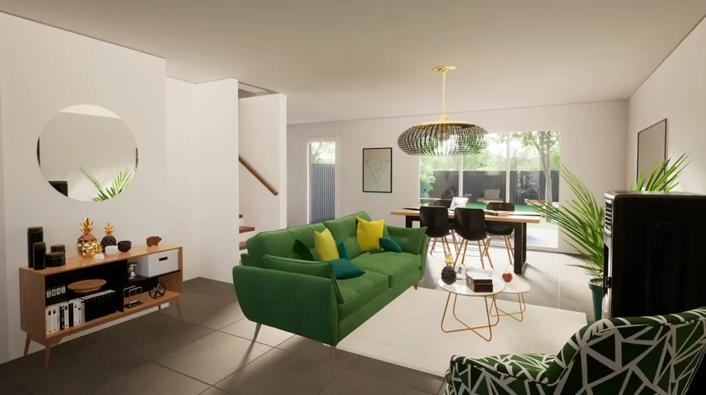 Salon moderne avec canapé vert, touches de couleur vive et salle à manger ouverte sur un extérieur verdoyant et lumineux.